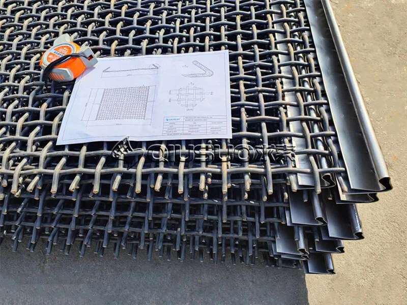 A pile of 65Mn crimped wire mesh with a drawing on the top