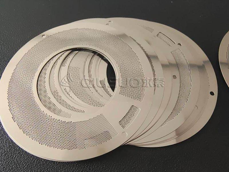 Many pieces stainless steel 0.5mm Hole Perforated Metal Mesh Discs