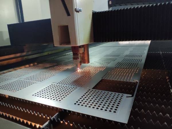 Laser cutting perforated metal parts