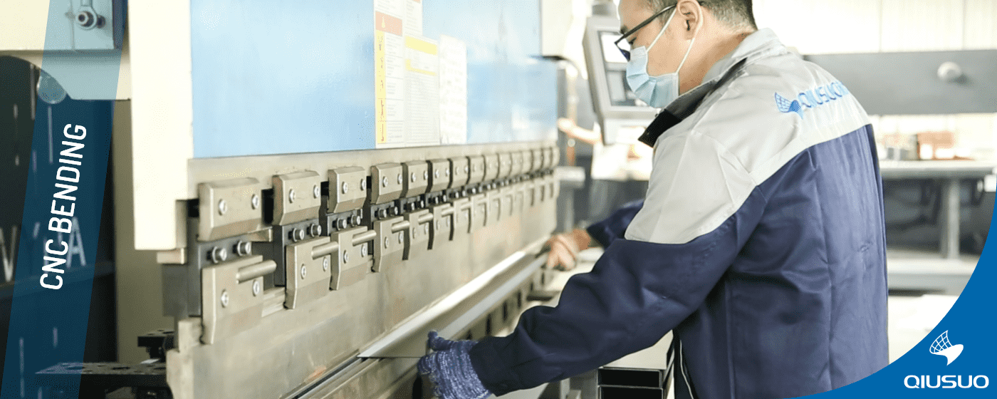 The worker operates the bending machine to bend the plate