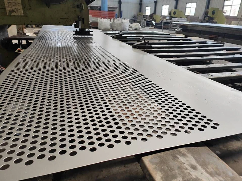 A 20 to 500-ton CNC sheet metal punching machine is performing circular punching on a metal sheet.