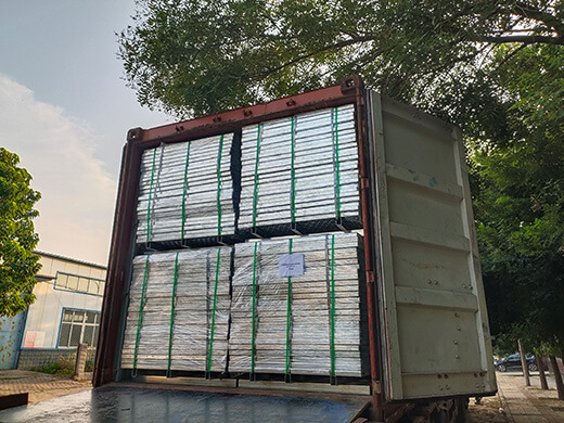 O grip safety gratings are placed in a container for shipping.