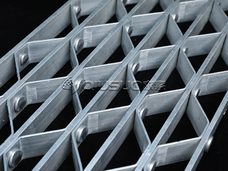 Cross bar detail of a riveted bar on metal bar grating