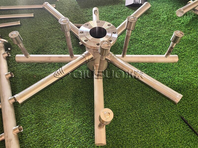Assembled wedge wire screen water distributor bottom collector on green carpet