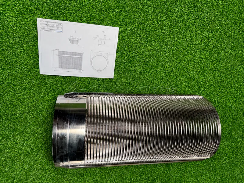 The wedge wire screen cylinder and the drawing are placed on the green inspection pad.