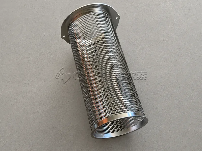 A wedge wire screen cylinder is placed on the floor.